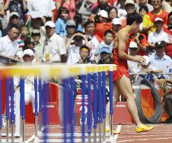 China's Olympic hurdle champion pulls out of race