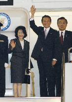 Aso leaves for Beijing for ASEM