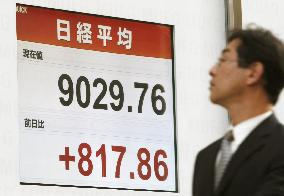 Nikkei closes above 9,000 for 1st time since Oct. 21