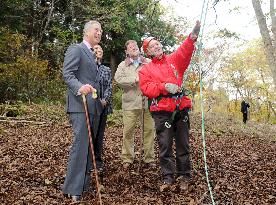 Prince Charles walks around in woods in Nagano Prefecture