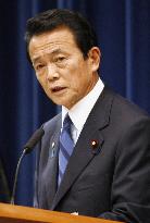 Aso unveils 26.9 tril. yen new stimulus package to tackle crisis