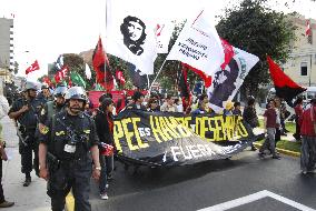 People demonstrate against APEC