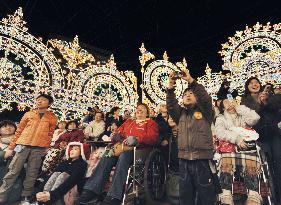 Children enjoy 'Kobe Luminarie' prior to opening