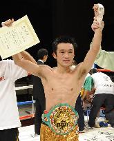 Nishioka gets TKO in 12th to retain WBC title