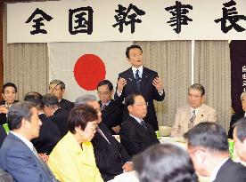 Aso to go for cash benefit program despite growing opposition