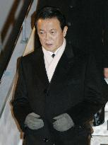 Aso arrives in Switzerland for Davos economic forum