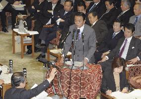 Aso willing to review split-up of postal services