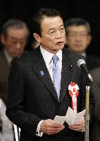 Aso vows to resolve island row with Russia