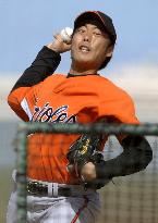 Baltimore right-hander Uehara pitches during batting practice