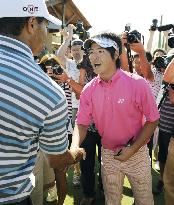 'Nice to meet you,' Japan golfer Ishikawa greets superstar Woods