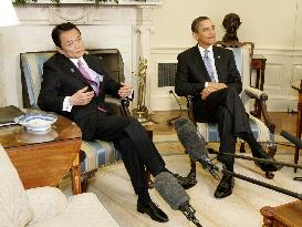 Obama, Aso agree to boost ties, work hand-in-hand to spur economy