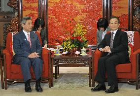 Japan's Nakasone says agreed with China to urge N. Korea restraint
