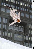 Freestyle skiers flying high in Shinjuku