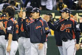 Japan advances to WBC 2nd round by beating S. Korea 14-2