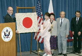 Flag of Japanese soldier returned to family after 6 decades