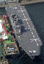 Japan's largest 'helicopter carrier' commissioned amid concerns