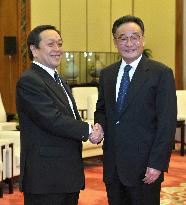 Japanese Defense Minister Hamada talks with China's Wu