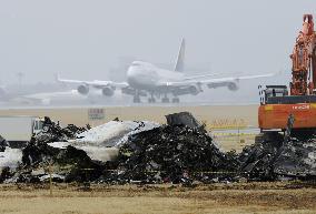 Narita reopens main Runway A after removing cargo plane wreckage
