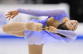 Asada 3rd, Kim in commanding lead at world c'ships