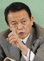 Aso to decide on election on opposition response to extra budget