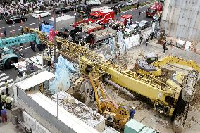 Pile driver overturns in Tokyo, injures 6, 2 of them seriously