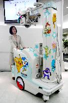 X-ray machine decorated with Pokemon characters