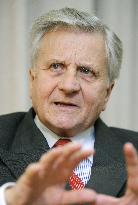 Trichet expects economic recovery in 2010, hints at rate cut in May