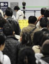 Japan calls on public for alert, composure over swine flu