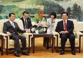 Japan, China agree on information exchange over swine flu
