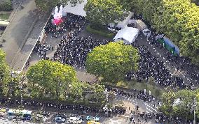 35,000 fans attend funeral of Japanese rock singer Imawano