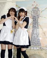 'Maid cafe' waitresses entertain visitors to Osaka tower