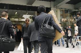 Japan Post official nabbed for permitting postal discount abuse
