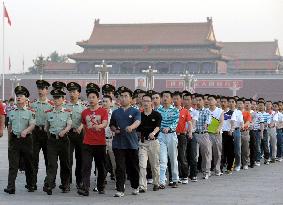 Policemen on strict alert in Beijing's Tiananmen Square