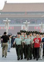 Policemen on strict alert in Beijing's Tiananmen Square