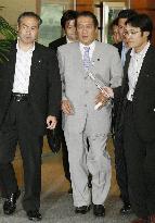 Hatoyama leaves Cabinet over Japan Post row