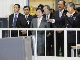 Crown Prince Naruhito inspects recycling plant