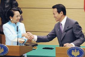 Aso, Arroyo agree on need to implement U.N. resolution