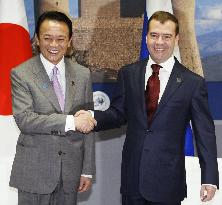 Aso, Medvedev meet in Italy