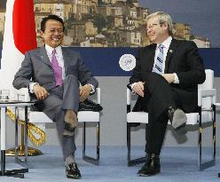 Aso holds talks with Rudd in Italy