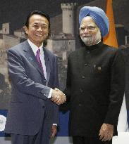 Aso holds talks with Singh in Italy