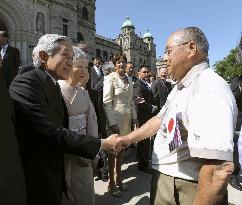 Emperor, empress meet Japanese-Canadian photographer