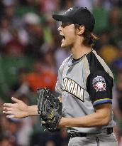 Darvish goes distance in romp over Hawks