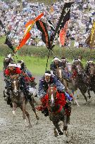 Armored men compete in 1,000-m horse race in Fukushima festival