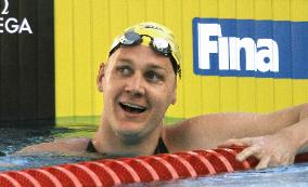 Brenton Rickard wins men's 100m breaststroke