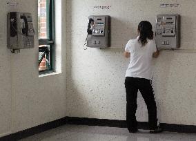 N. Korean defector learns how to use phone