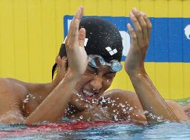 Japan's Koga wins silver in men's 50m backstroke