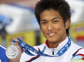 Japan's Koga wins silver in men's 50m backstroke