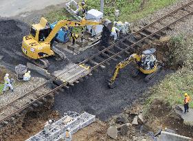 Torrential rains wash railway base away in Okayama Pref.