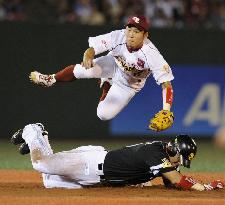 Eagles' Uchimura completes double play