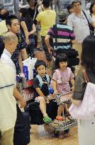 Return rush of midsummer holidaymakers peaks in Japan